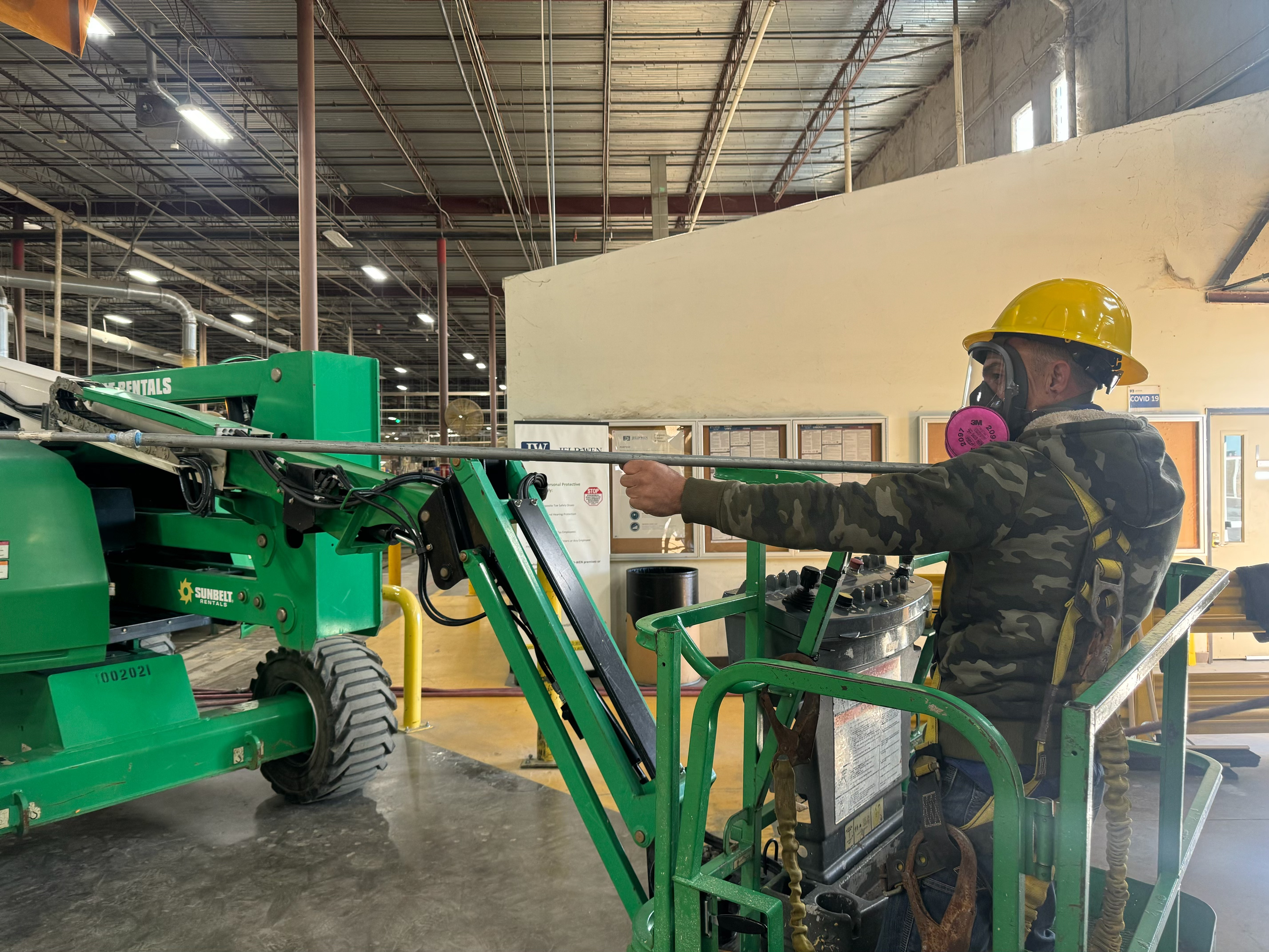 Explosive dust cleanup with worker